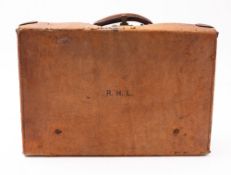 Three brown leather cases. Comprising tw