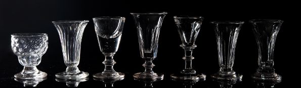 A mixed group of glass jellies, custard cups, a pair of punch cups, a medicine measure,