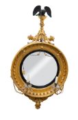 A Regency carved giltwood and gesso circular convex girandole mirror,
