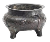 A Chinese bronze tripod censer cast with panels of mythical beasts on a leiwen ground,