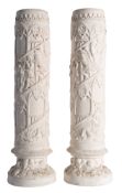 A pair of plaster vases in Gothic taste, 20th century; in the manner of Trajan's Column,