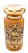 A Royal Pharmaceutical Society commemorative glass jar and cover decorated with a coat of arms