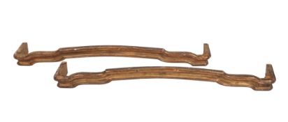 A pair of 19th century giltwood moulded pelmets of shaped domed outline, 150cm and 148cm length,