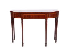 A 19th century mahogany and inlaid serving table, of D shaped breakfront outline,