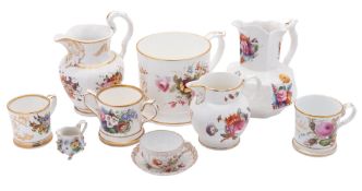 A mixed lot of mid 19th century English porcelain loving cups, jugs and mugs [some commemorative],