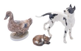 Three Continental porcelain figures comprising a Rosenthal Drake, after an original by Willy Zugel,