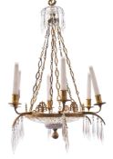 A gilt metal and cut glass six light chandelier and a pair of wall appliques en suite,