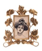 An Edwardian gilt brass rectangular photograph frame,