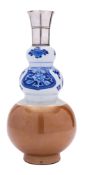 A Chinese porcelain vase, Kangxi of triple gourd form,