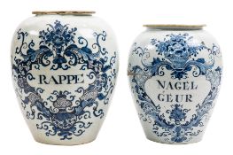 Two Dutch Delft tobacco jars each of oviform and painted in blue with a cartouche captioned 'Nagel