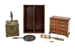 A walnut moneybox in the form of a miniature George III chest of drawers,