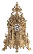 A modern gilt-metal cast mantle clock in the Louis XIX style the eight-day duration movement having