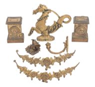 A collection of brass mounts and other items,