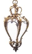 A fine ormolu and glazed ceiling lantern in Louis XV style, 19th century; of tapering bombe form,