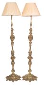 A pair of heavy brass standard lamps, in Rococo Revival style,