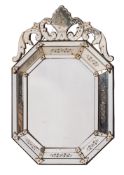 A Venetian octagonal marginal wall mirror, with pierced acanthus scroll and palmette cresting,