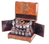 A French brass marquetry inset kingwood decanter case,