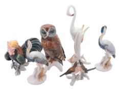 Six Karl Ens porcelain bird figures comprising an Owl, Cockerel, two Herons,