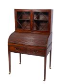 A George III mahogany and inlaid cylinder tambour fronted bureau, bordered with boxwood lines,