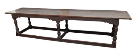 A substantial oak refectory table,