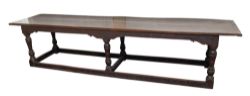 A substantial oak refectory table,
