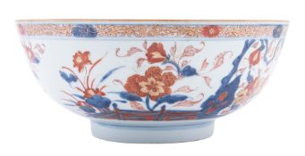 A Chinese Imari bowl, Qianlong the interior painted with a large vase of flowers,