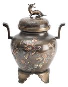 A Japanese bronze koro & cover, Meiji period with mythical beast [kirin] finial,