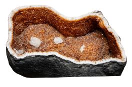 A large smoky quartz (amber-brown) half geode,