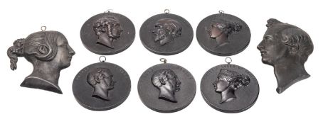 A group of six Bois Durci portrait roundels,