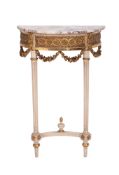 A French white and gilt decorated domed pier mirror and console table, in the Louis XVI taste,