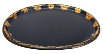 A large Victorian oval parcel gilt black papier-mâché tray,