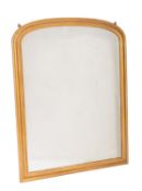A Victorian giltwood framed arched overmantel mirror,
