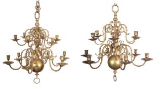 A matched pair of Dutch brass twelve light chandeliers, in early 18th century style,