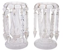 A pair of clear glass table lustres with domed foot,