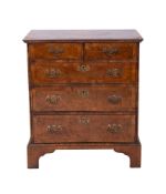 A walnut crossbanded and inlaid rectangular chest of small size in the 18th century style,