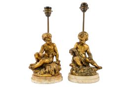 A pair of Italian gilt composition and alabaster mounted figural table lamps,