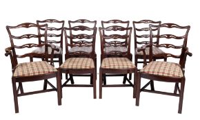 A set of eight mahogany ladder back dining chairs, in the George III style,