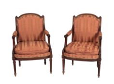 A pair of late 19th century French rosewood Fauteuils in the Louis XVI taste,