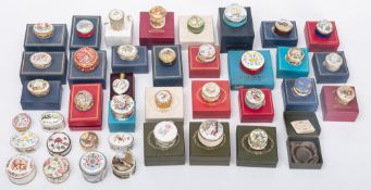 A collection of thirty-seven various Halcyon Days, Staffordshire and other enamel patch boxes,