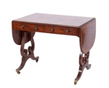 A Regency mahogany and inlaid sofa table, bordered with boxwood and ebony lines,