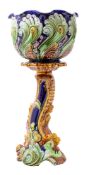 An English majolica jardiniere and stand,