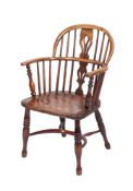 A 19th century elm, ash and beech stick back Windsor elbow chair,