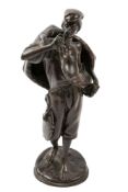 A Continental patinated bronze model of a young itinerant male,