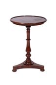 A Victorian mahogany circular occasional table on turned baluster column,