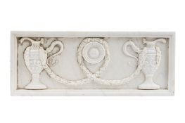 A rectangular carved white marble panel in Neoclassical style,
