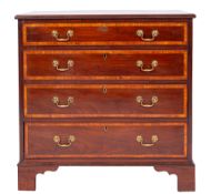 A George III mahogany and satinwood cross banded and inlaid rectangular chest, with a moulded top,