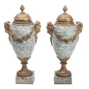 A pair of Campan marble and gilt metal mounted twin handled urns, in 18th century style,
