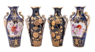 A pair of Coalport cobalt blue and gilt ground vases of Chelsea shape and a similar pair of black