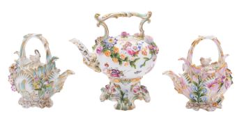 A Coalport flower-encrusted kettle, cover and stand and two shell-moulded teapots and covers,