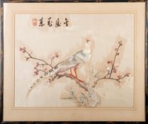 Two pairs of Chinese embroidered silk pictures depicting birds amongst flowers and foliage each